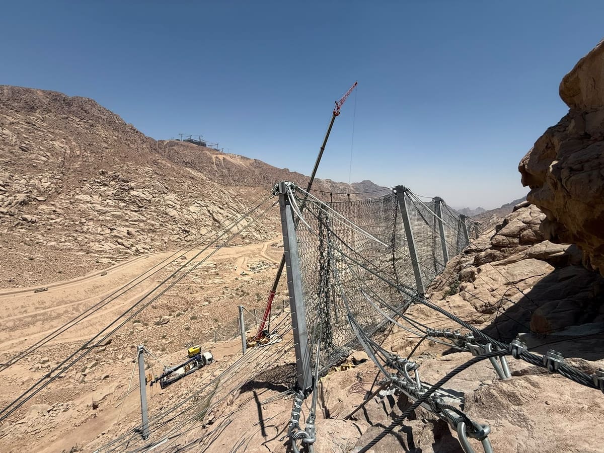 Rockfall barrier line installed along a valley slope